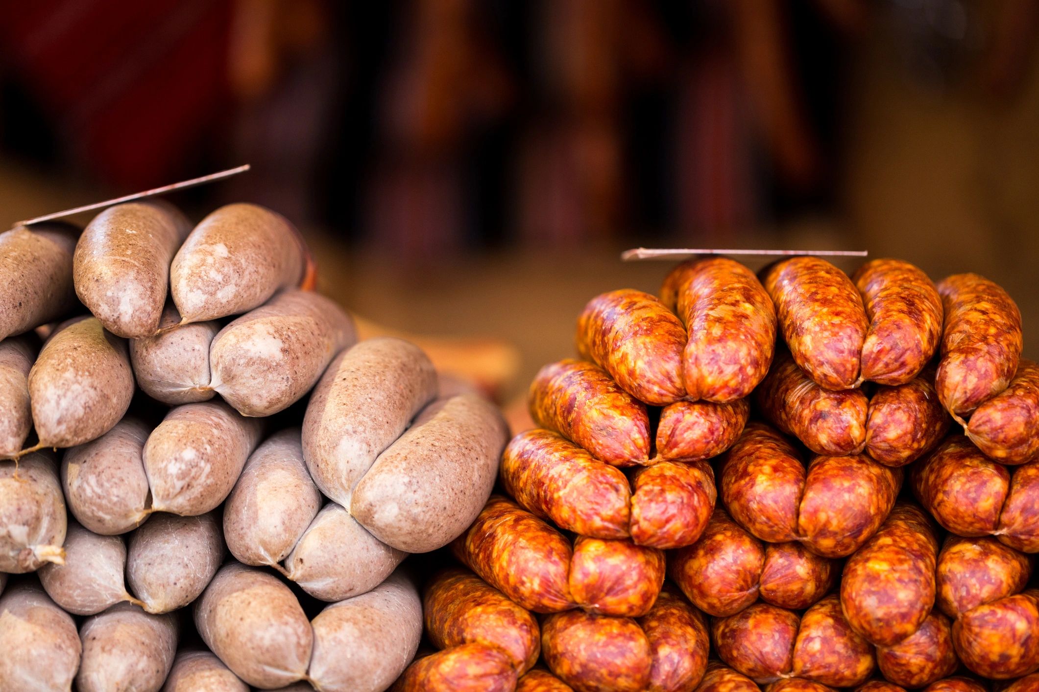 Selection of smoked sausages and salami for sale